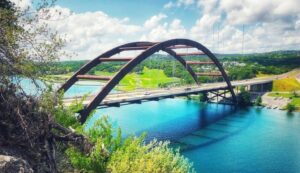 Image of a bridge going over a river in Texas. Representing that you do not have to travel to get ADHD testing in Houston, Dallas, or anywhere in Texas. You can get your ADHD diagnosis in Dallas from home.
